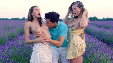 A duo of light-haired femmes have a threeway with a twunk