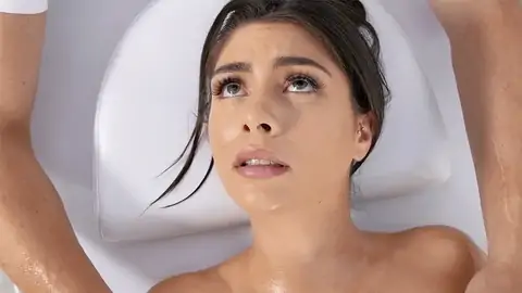 Lubed up black-haired is getting her labia finger-tickled