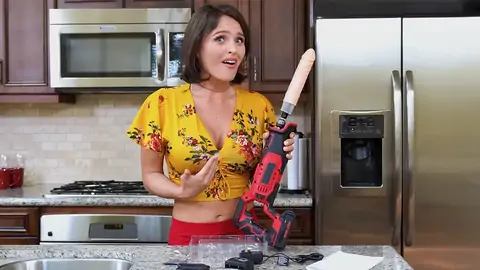 Prepping to tear up the dark-haired babe with a machine